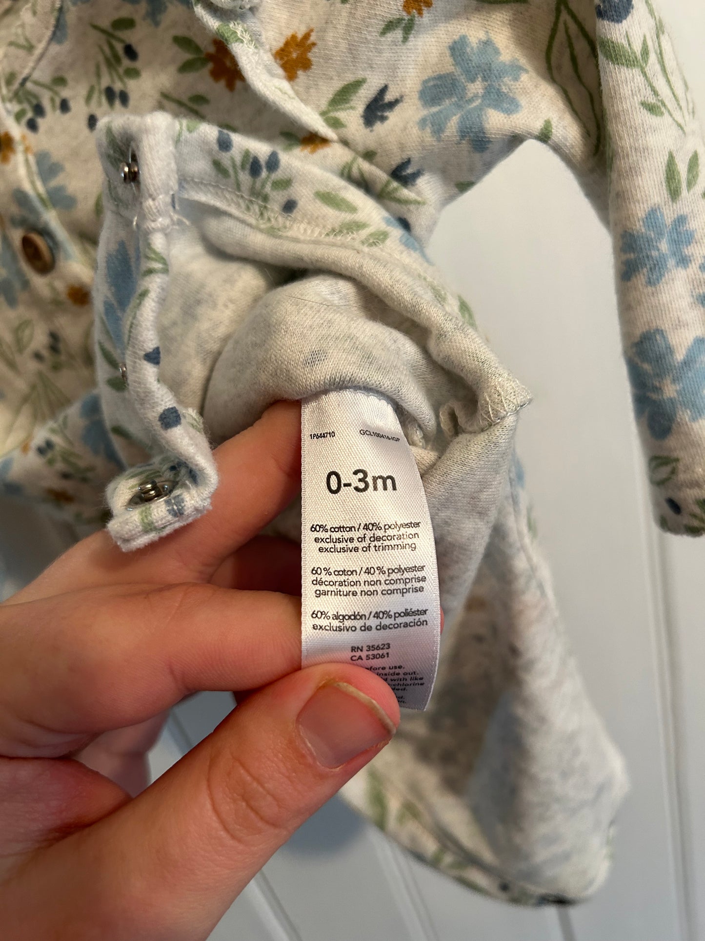 Carters 0/3m blue floral onesie