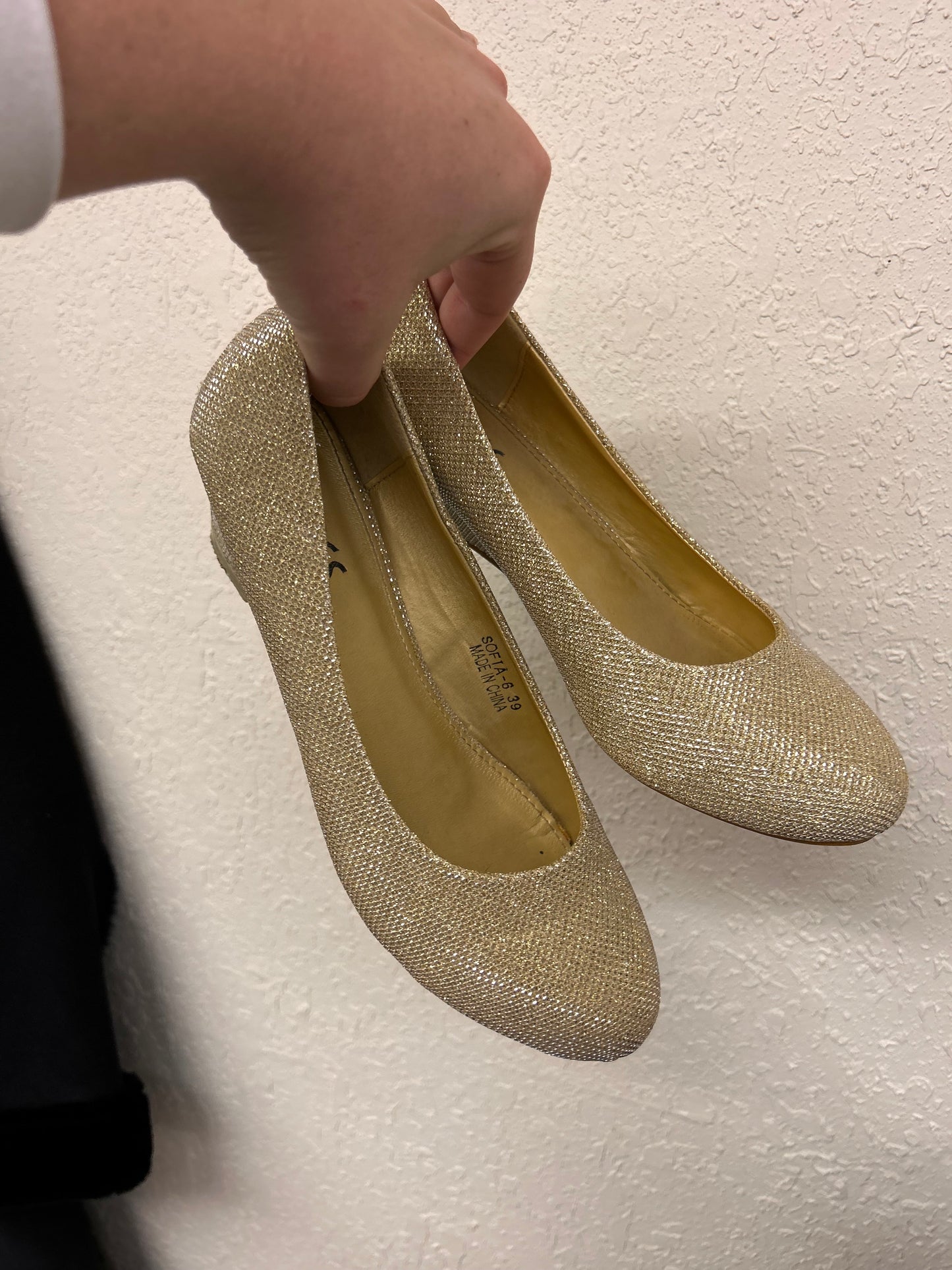 Steps 6 gold glitter wedge heels