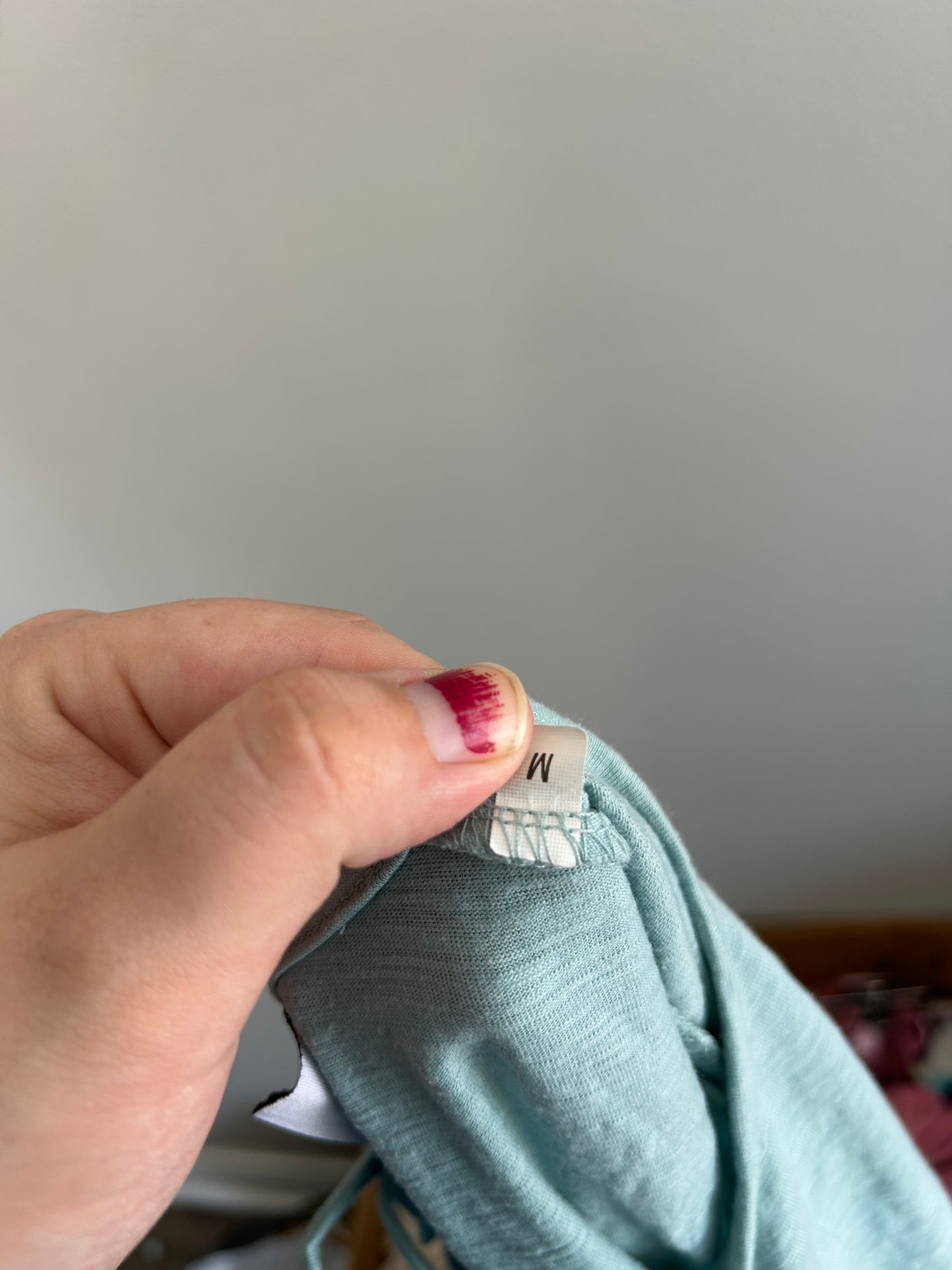 WNT medium blue ruffle open back blouse