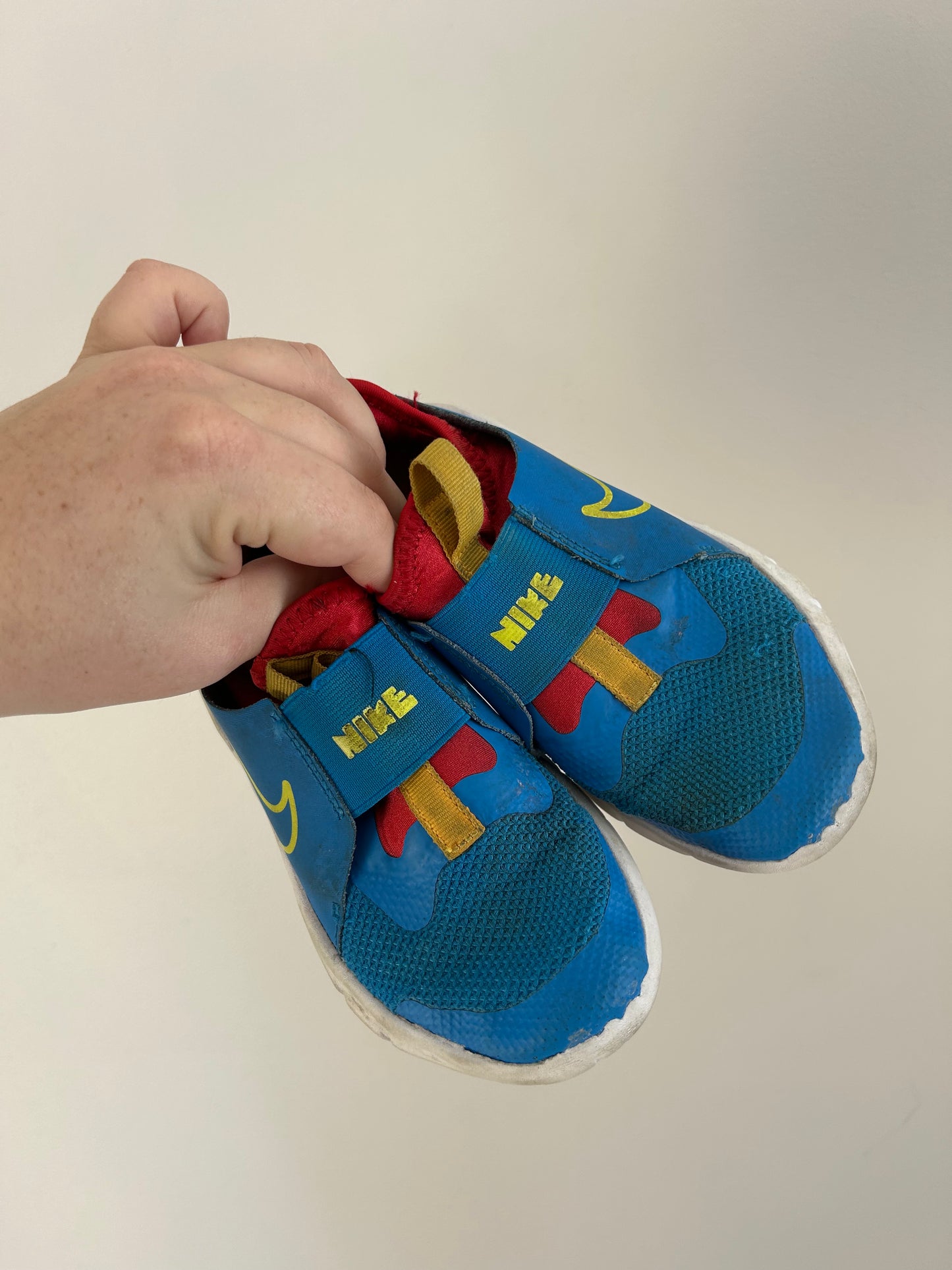 Nike 13C blue & red slip on runners