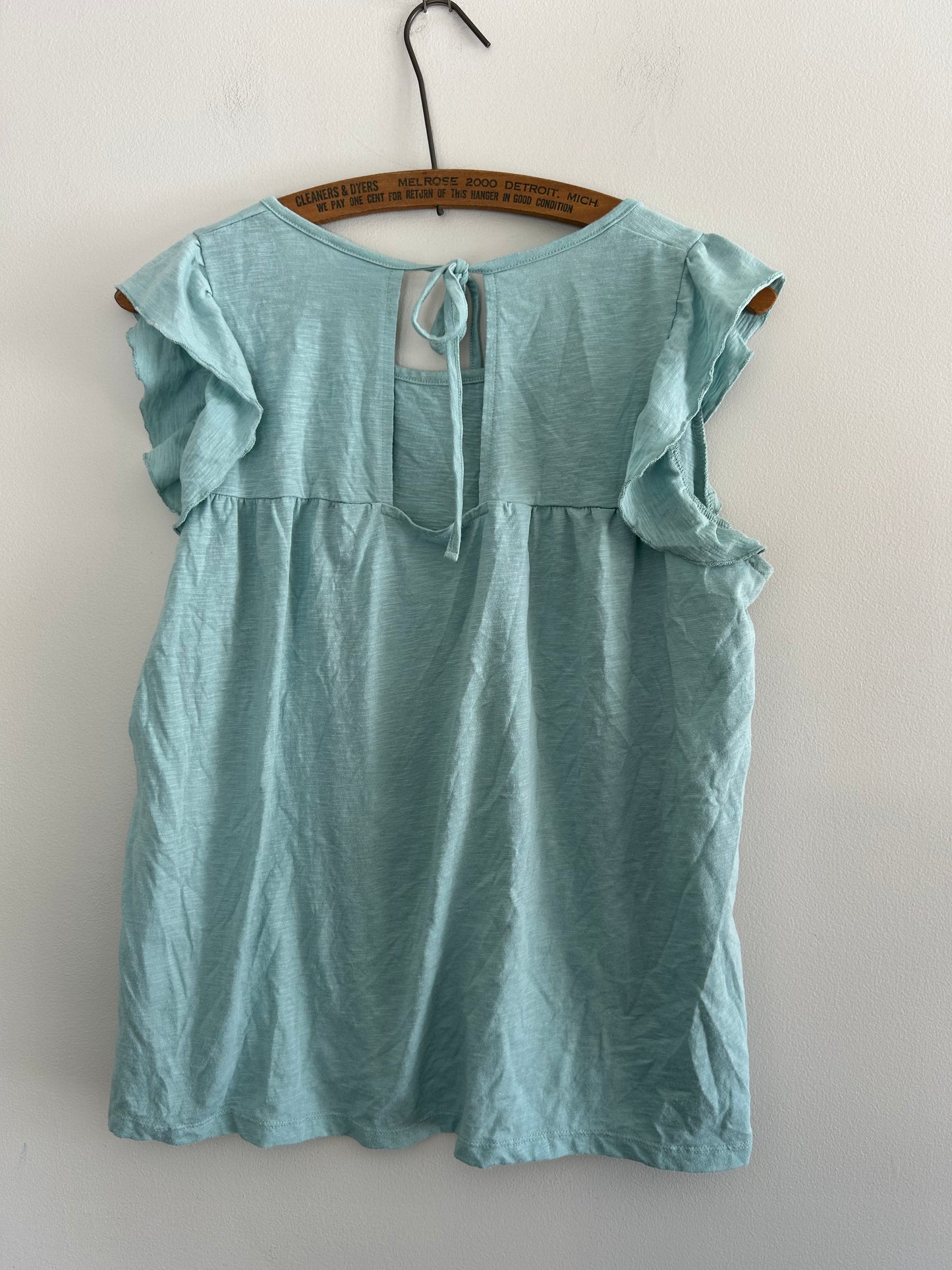 WNT medium blue ruffle open back blouse